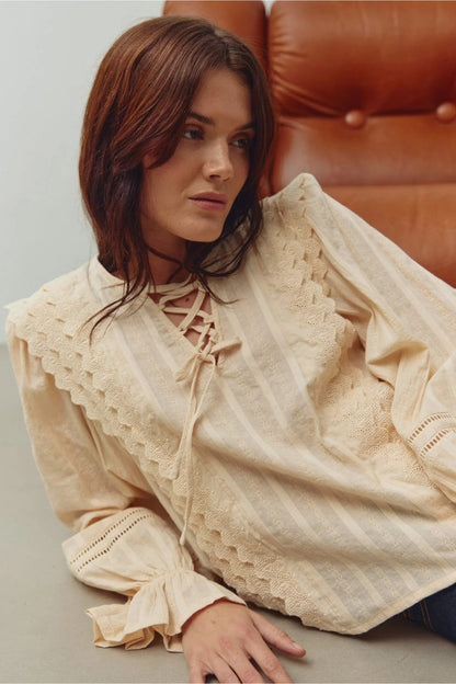 Model wearing Noella 15320002 N-Maliyah Blouse Ivory by Noella, shop the Noella collection at Dotique online store.