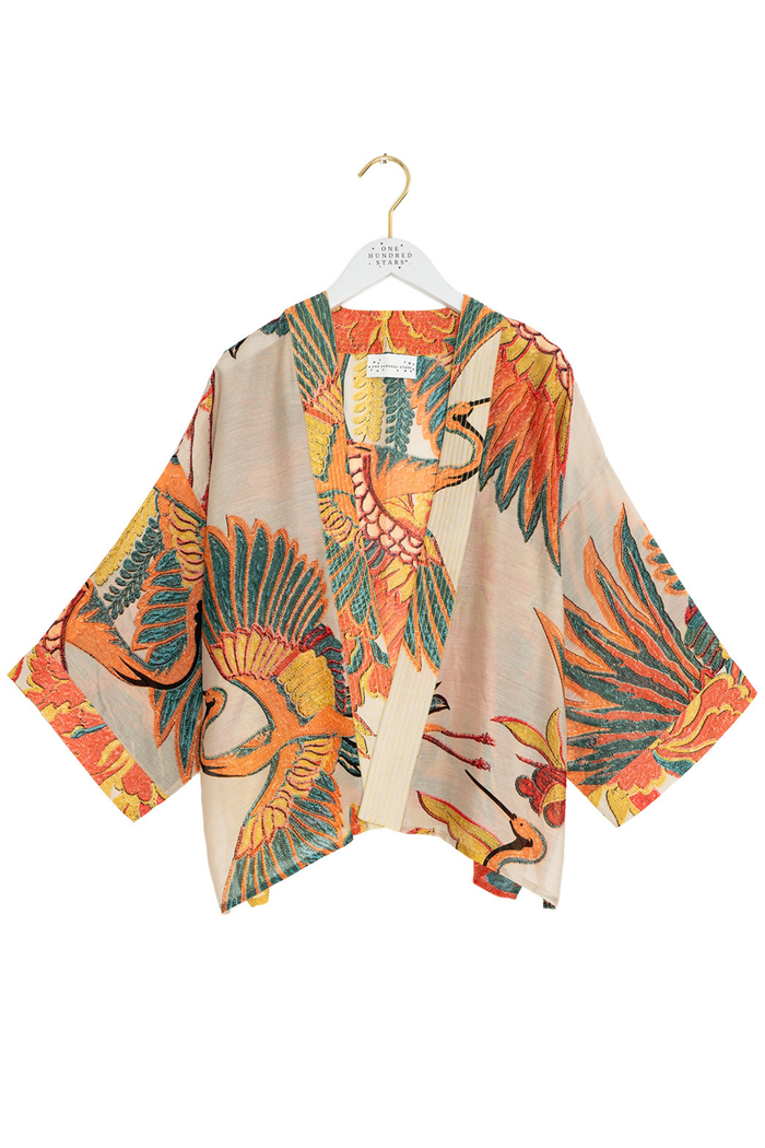 Crane Stone kimono by One Hundred Stars in a premium modal-cupro blend. Lightweight, fluid and perfect for layering over dresses or tops. Shop at Dotique.