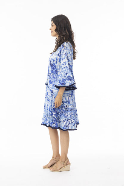 Model side profile wearing Orientique 40188 Okayama Dress Layers Frill Sleeve Print by orientique, shop orientique at Dotique