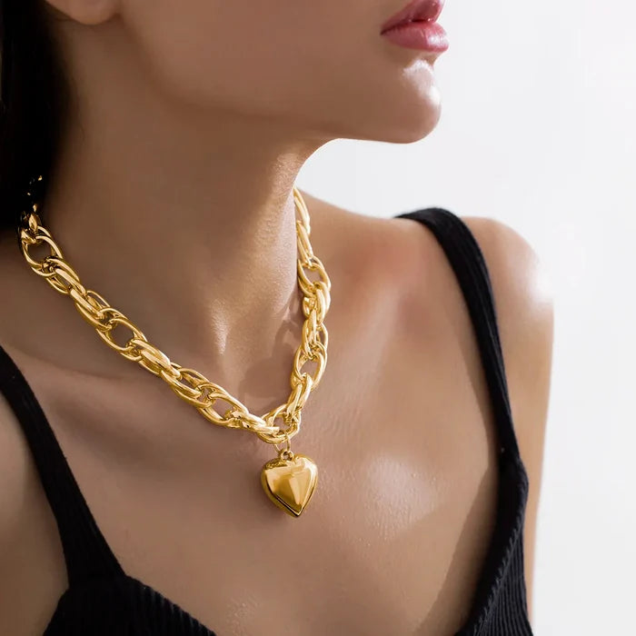 Oversized heart pendant necklace with chunky chain, gold color