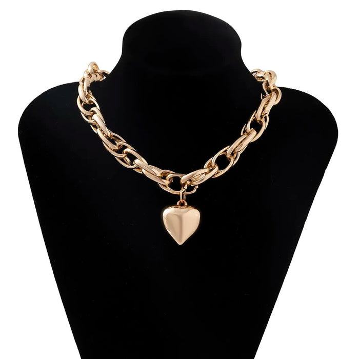 Oversized heart pendant necklace with chunky chain, gold color