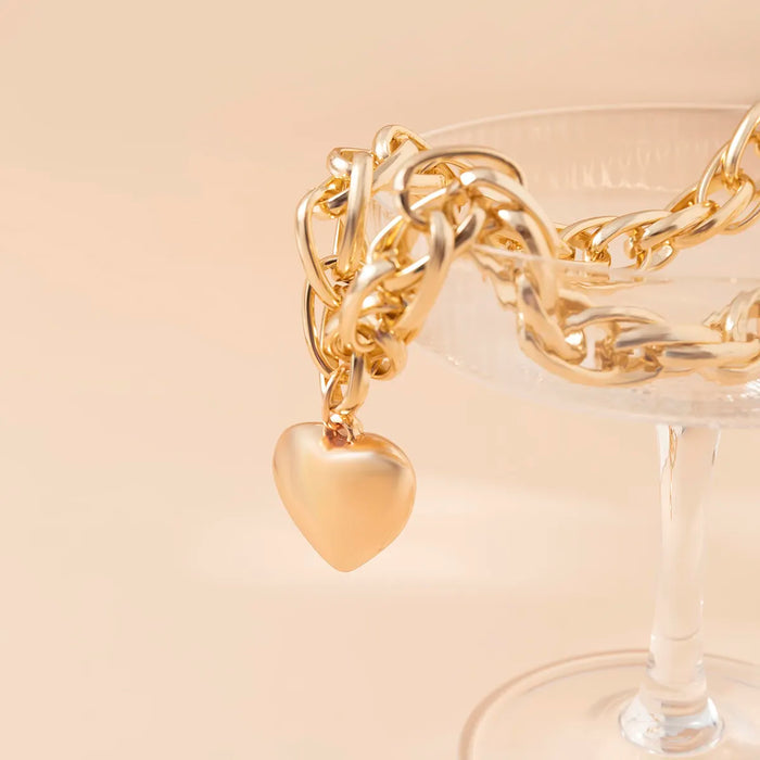 Oversized heart pendant necklace with chunky chain, gold color