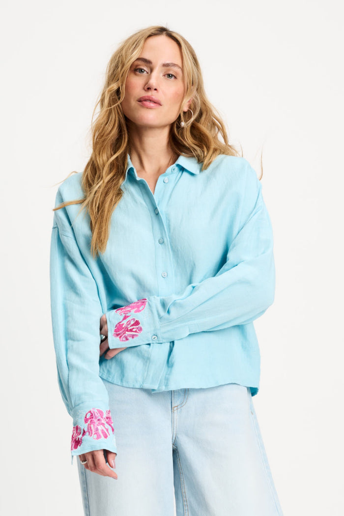 Woman wearing Pom Amsterdam SP9499 Amsterdam Blue Sequins Urban Flora Blouse by Pom Amsterdam, shop Pom Amsterdam at Dotique