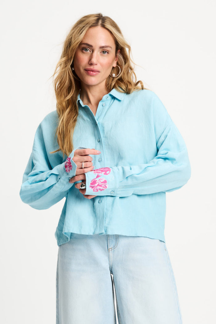 Woman wearing Pom Amsterdam SP9499 Amsterdam Blue Sequins Urban Flora Blouse by Pom Amsterdam shop Dotique for chic style
