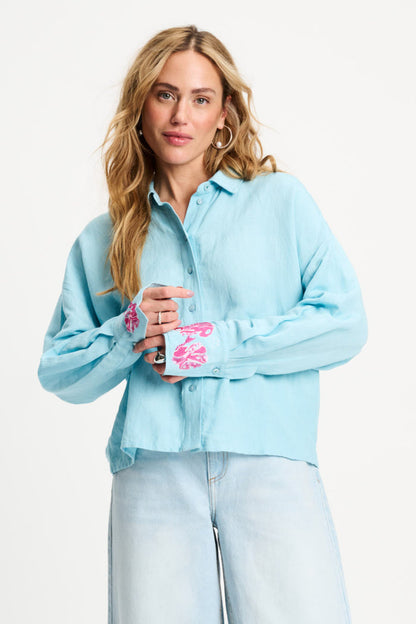 Woman wearing Pom Amsterdam SP9499 Amsterdam Blue Sequins Urban Flora Blouse by Pom Amsterdam shop Dotique for chic style