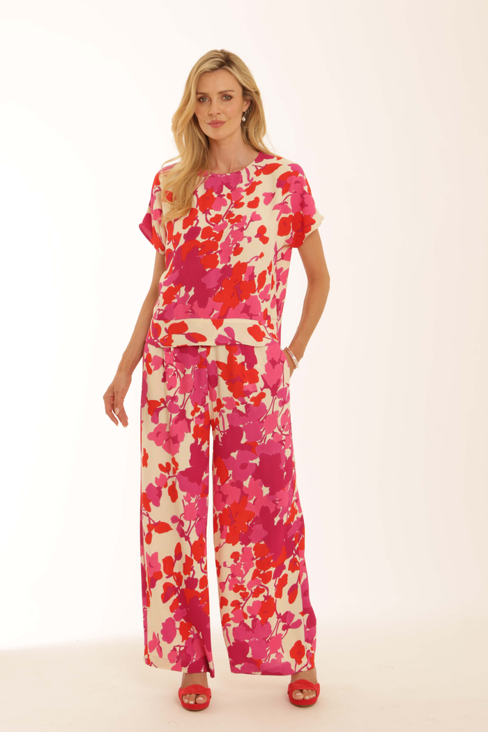 Model wearing Pomodoro 62620 Trailing Flower Top Pink by pomodoro, shop pomodoro at Dotique in vibrant floral print design