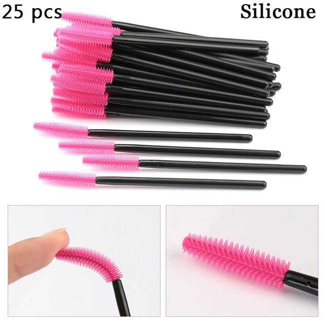 A collection of disposable eyelash brushes in various colors including black, pink, purple, blue, and white, with plastic handles.