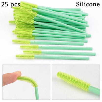 A collection of disposable eyelash brushes in various colors including black, pink, purple, blue, and white, with plastic handles.