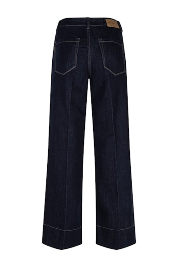 dark blue wide-leg jeans back view with pockets and leather patch Shop the Dotique at Dotique