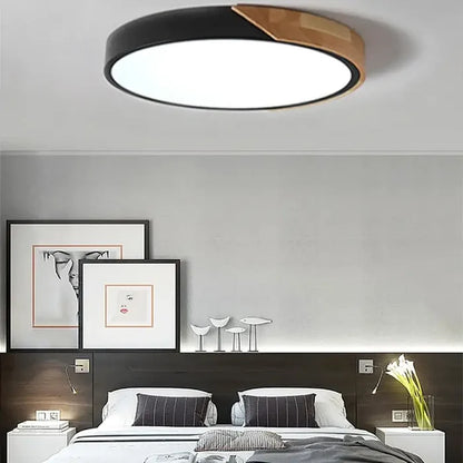 a bedroom with a bed and a lamp