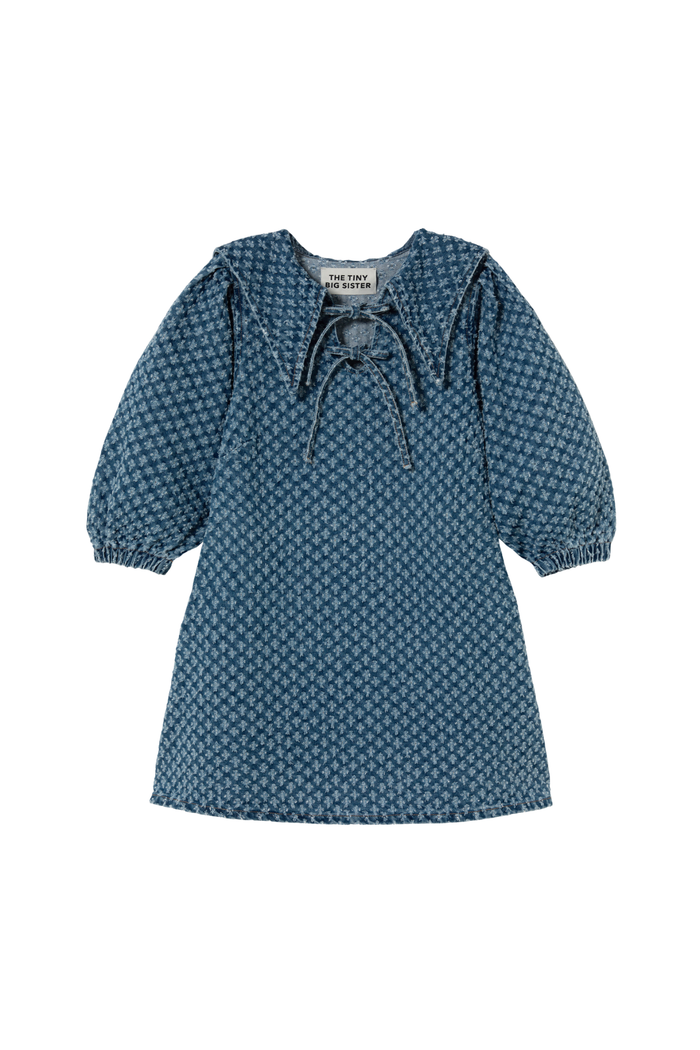 Tiny Big Sister puff sleeve denim dress in soft 100% cotton. A flattering, easy-to-wear summer style. Shop at Dotique.