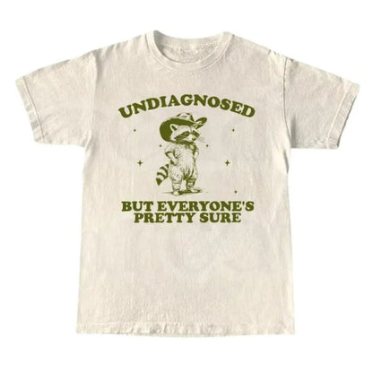 Undiagnosed But Everyone’s Sure T-Shirt – Funny Retro Humor Graphic Tee, Unisex Cotton Shirt