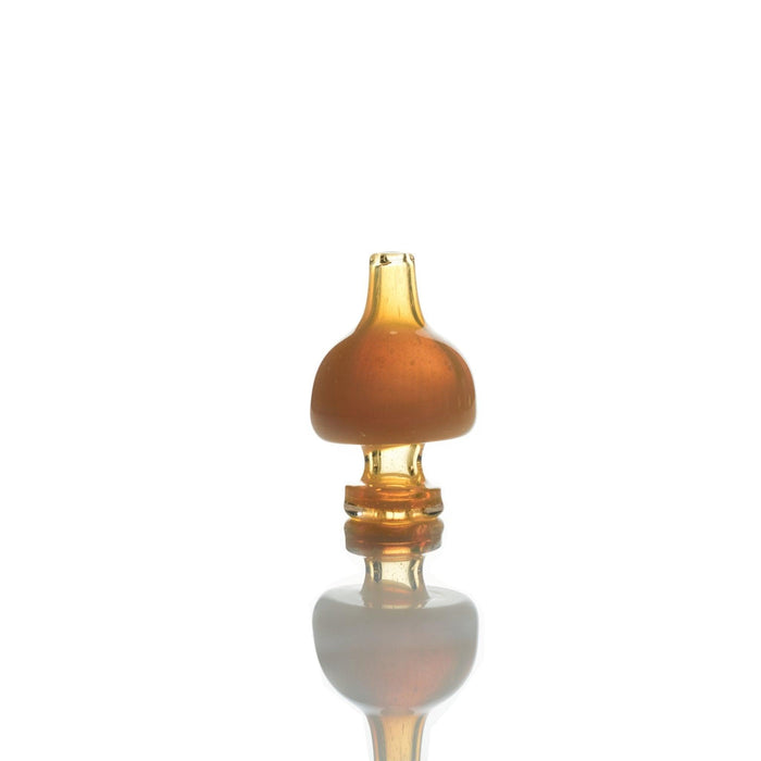 Side view of Vijil Glass Extra Light Milky Yellow Carb Cap showcasing milky yellow tint