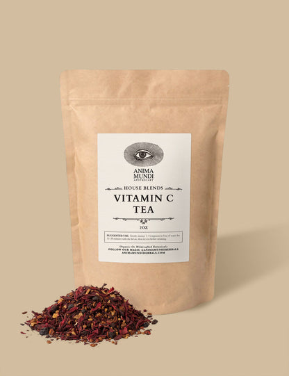 Vitamin C tea package with loose tea on a beige background