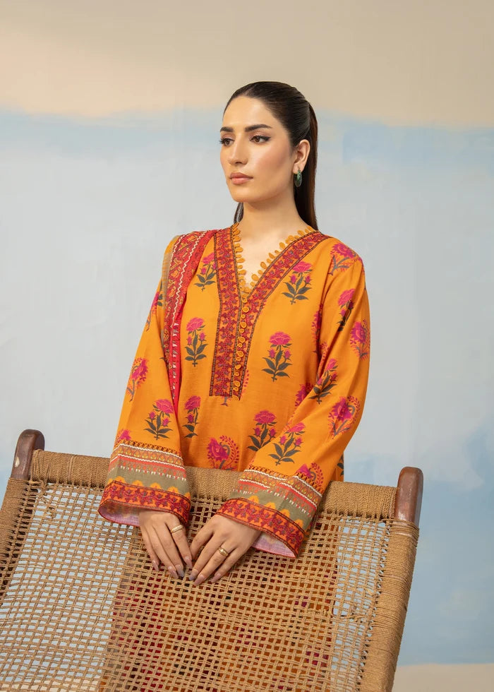 Women's winter 3-piece suit, orange printed kurta with pink floral motifs and V-neck embroidery