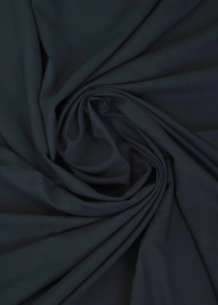 Dark black wash-and-wear fabric swirl with soft, smooth texture