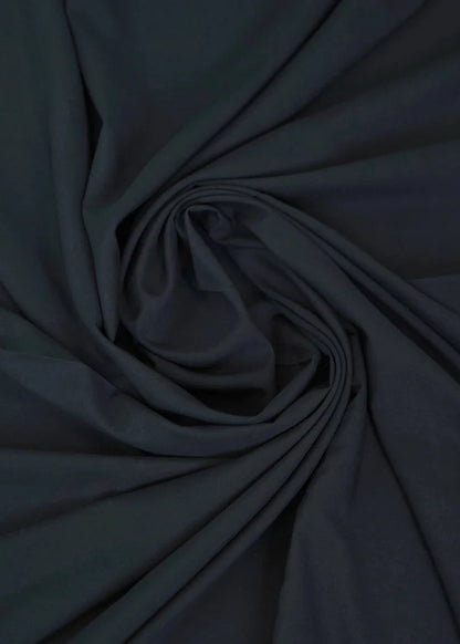 Dark black wash-and-wear fabric swirl with soft, smooth texture