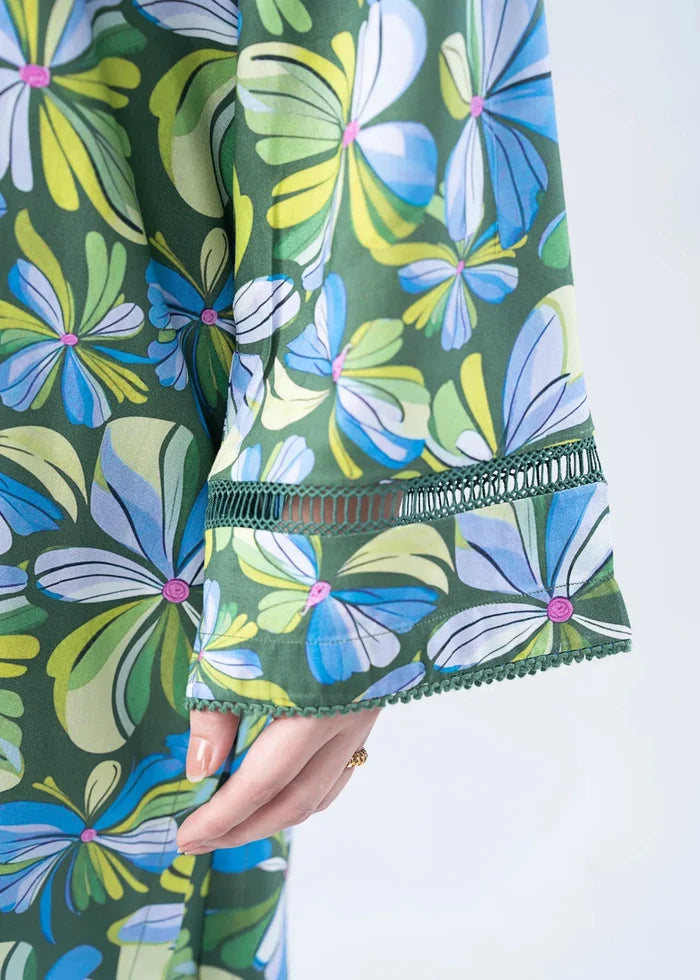 Women's co-ord set detail: green leaf-floral tunic hem with teal embroidered trim