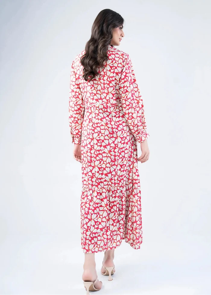 Pink and white abstract print long dress with long sleeves and tiered hem