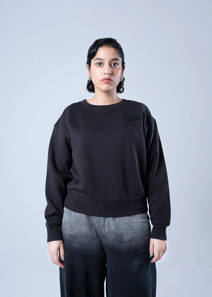 Black fleece crewneck sweatshirt with ribbed cuffs and hem, front view